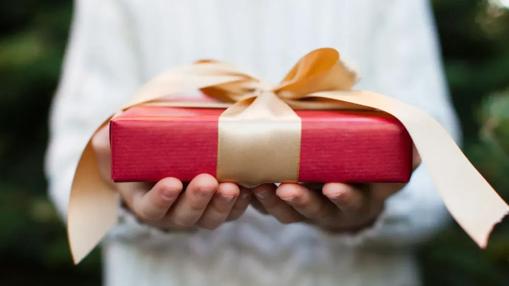 holiday-gift-held-hands